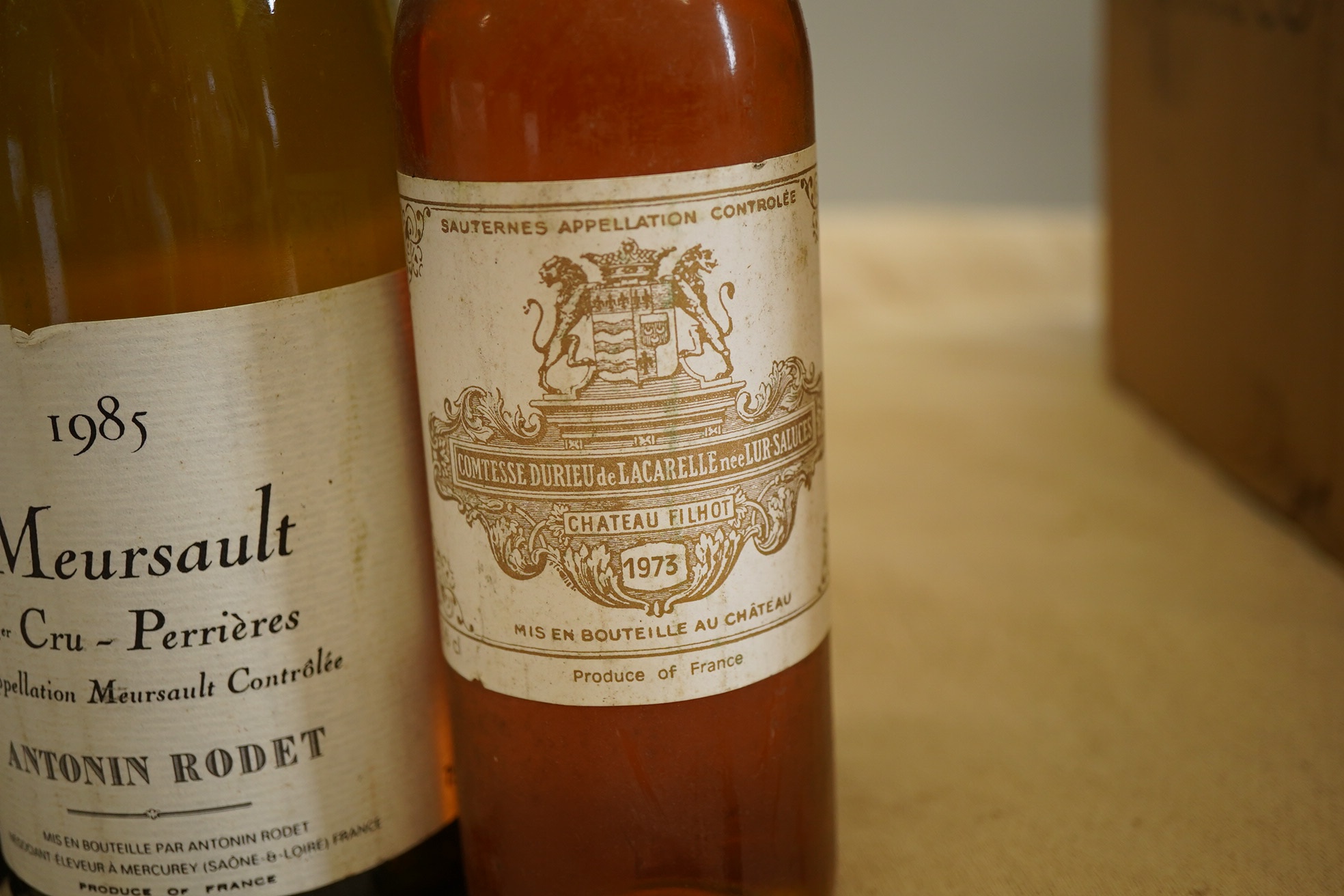 One bottle of 1985 Meursault 1er Cru, Antonin Rodet, one bottle of 2001 Batard Montrachet, two bottles of 1959 Meursault Charmes, Bouchard Pere & Fils and one half bottle of 1973 Chateau Filot, Sauternes. (5)